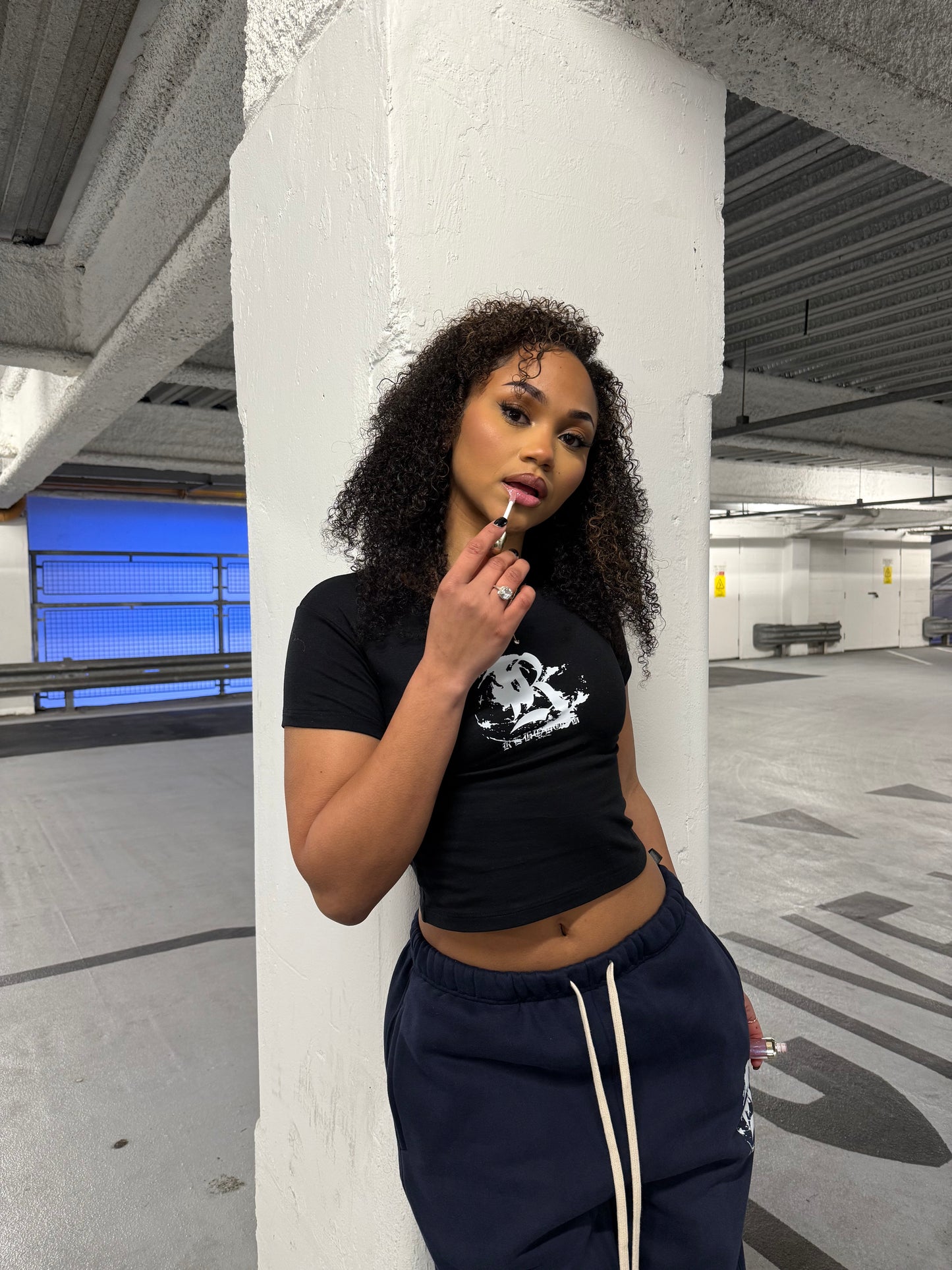 INTL WOMENS BABY TEE *BLACK*